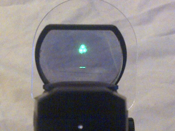 "predator" triple dots...one of 4 types of settings on my red/green dot...the others being a single dot, 4 crosshair arrows, and a biohazard symbol.